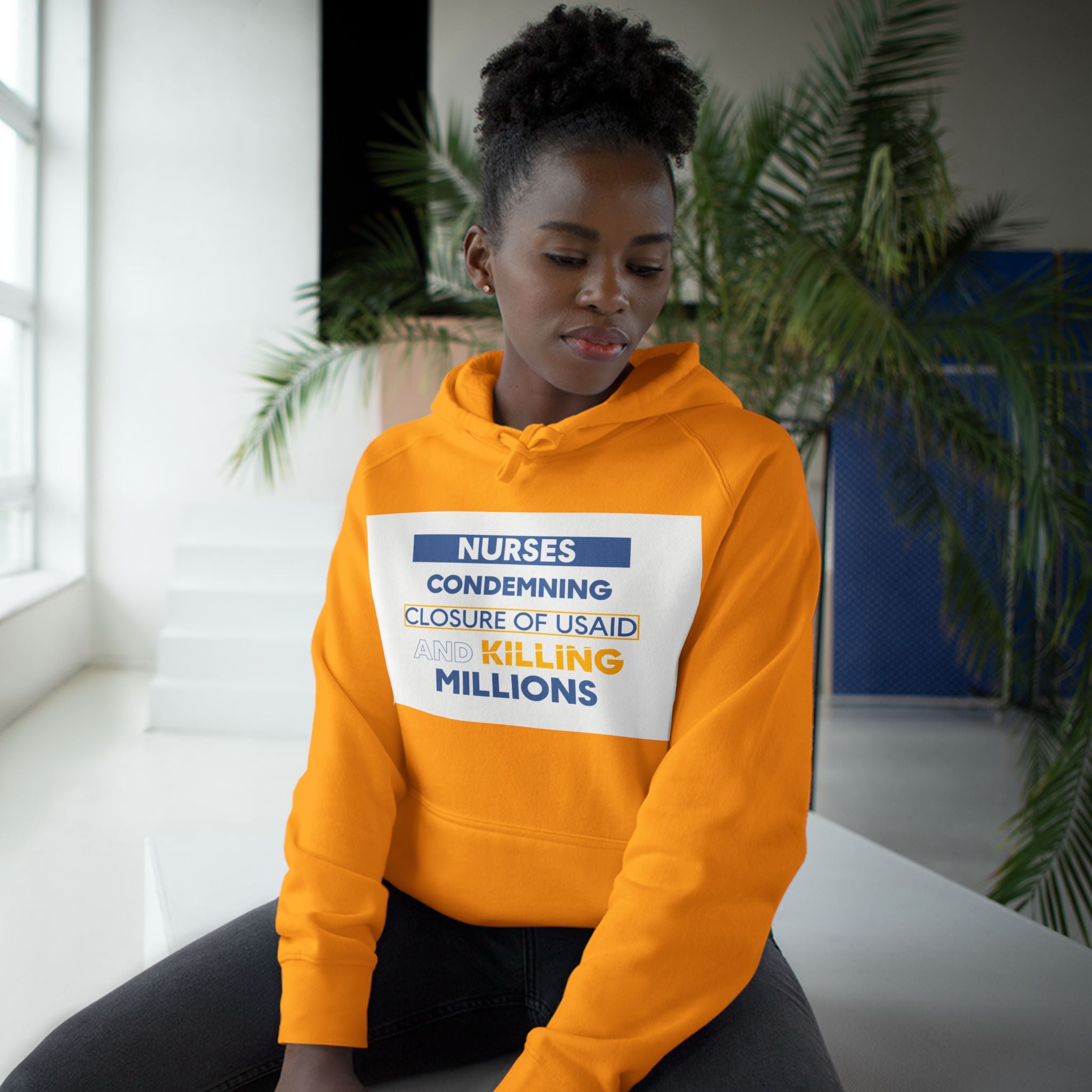 Unisex Mid-weight Hoodie - Nurses Condemning Closure of USAID (front) - Nurses For NIH CDC FEMA USAID And YOU (back) - 80% cotton, 20% Polyester - NFG-H-AC5101