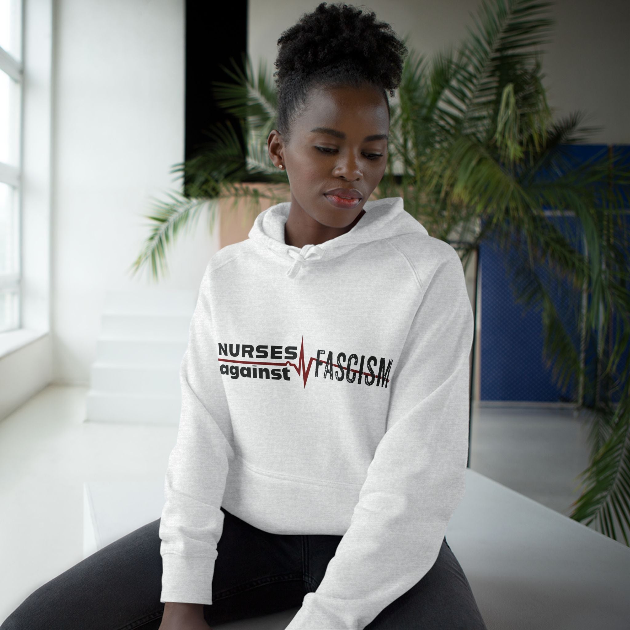 Unisex Mid-weight Hoodie - Nurses Against Fascism (front) - Nurses Against Cruelty (back) - 80% cotton, 20% polyester - NAF-H-AC5101