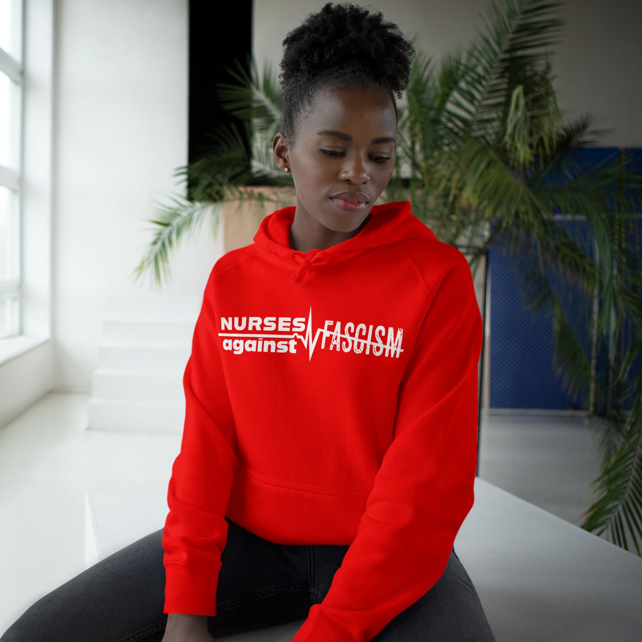 Unisex Mid-weight Hoodie - Nurses Against Fascism (front) - Nurses Against Cruelty (back) - 80% cotton, 20% polyester - NAF-H-AC5101