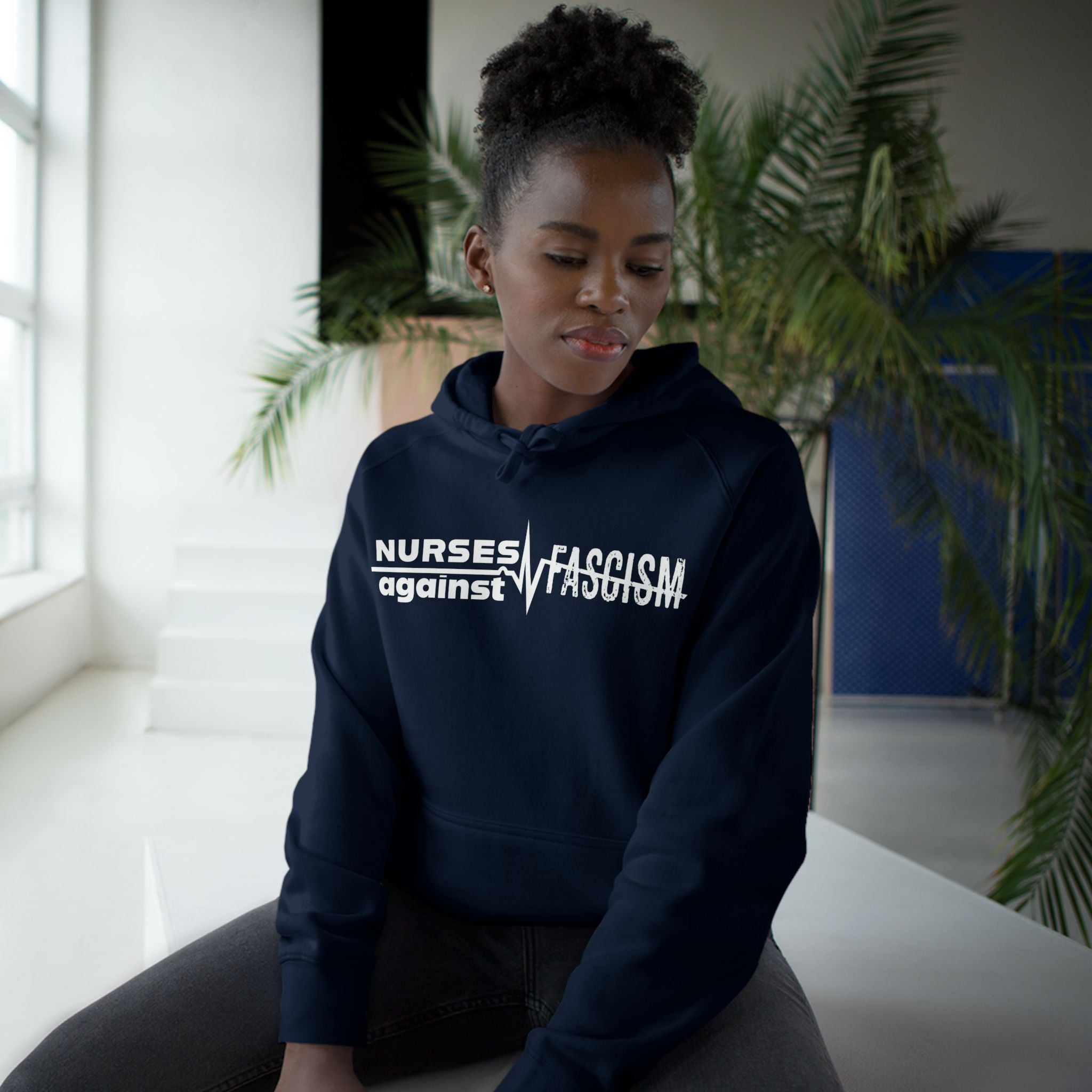 Unisex Mid-weight Hoodie - Nurses Against Fascism (front) - Nurses Against Cruelty (back) - 80% cotton, 20% polyester - NAF-H-AC5101