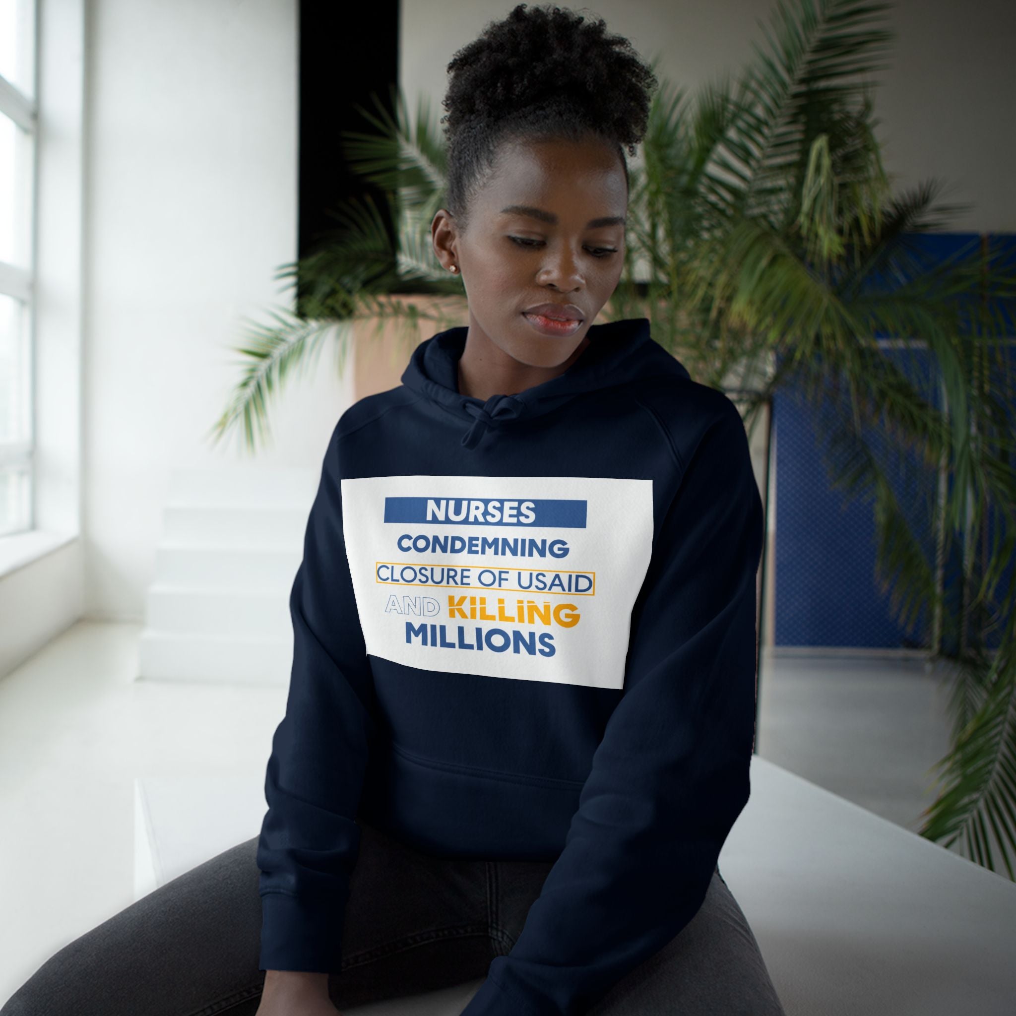 Unisex Mid-weight Hoodie - Nurses Condemning Closure of USAID (front) - Nurses For NIH CDC FEMA USAID And YOU (back) - 80% cotton, 20% Polyester - NFG-H-AC5101