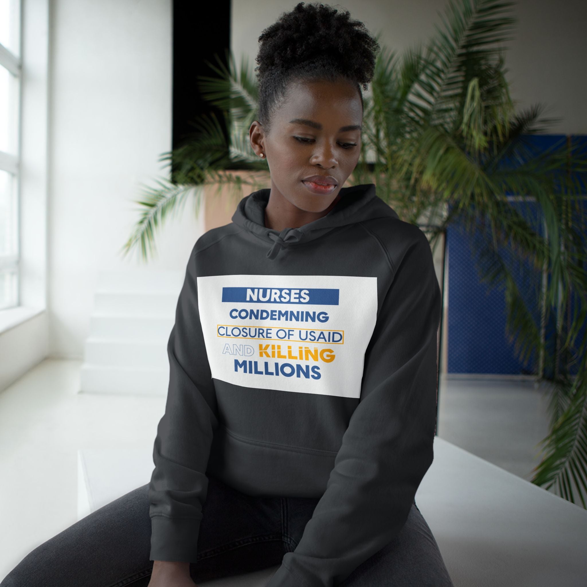 Unisex Mid-weight Hoodie - Nurses Condemning Closure of USAID (front) - Nurses For NIH CDC FEMA USAID And YOU (back) - 80% cotton, 20% Polyester - NFG-H-AC5101