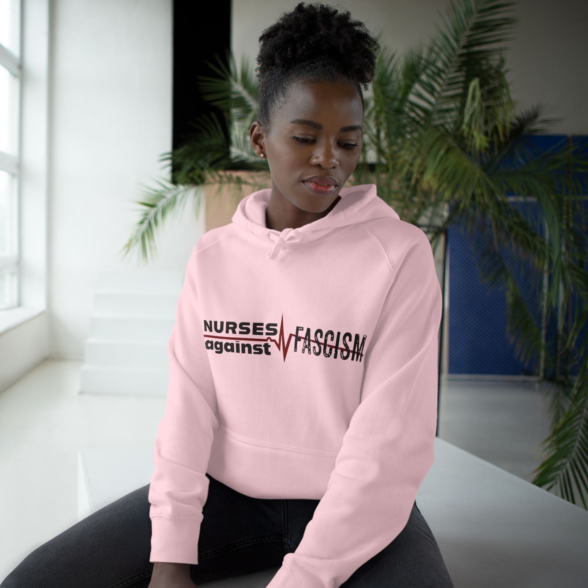 Unisex Mid-weight Hoodie - Nurses Against Fascism (front) - Nurses Against Cruelty (back) - 80% cotton, 20% polyester - NAF-H-AC5101
