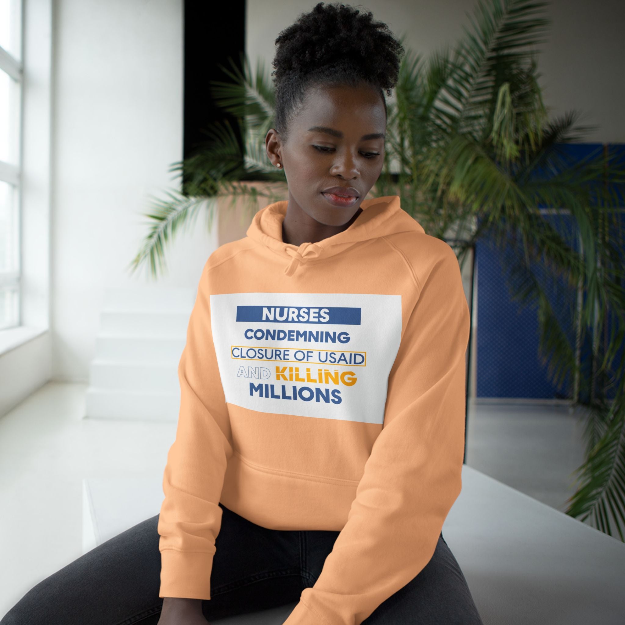 Unisex Mid-weight Hoodie - Nurses Condemning Closure of USAID (front) - Nurses For NIH CDC FEMA USAID And YOU (back) - 80% cotton, 20% Polyester - NFG-H-AC5101