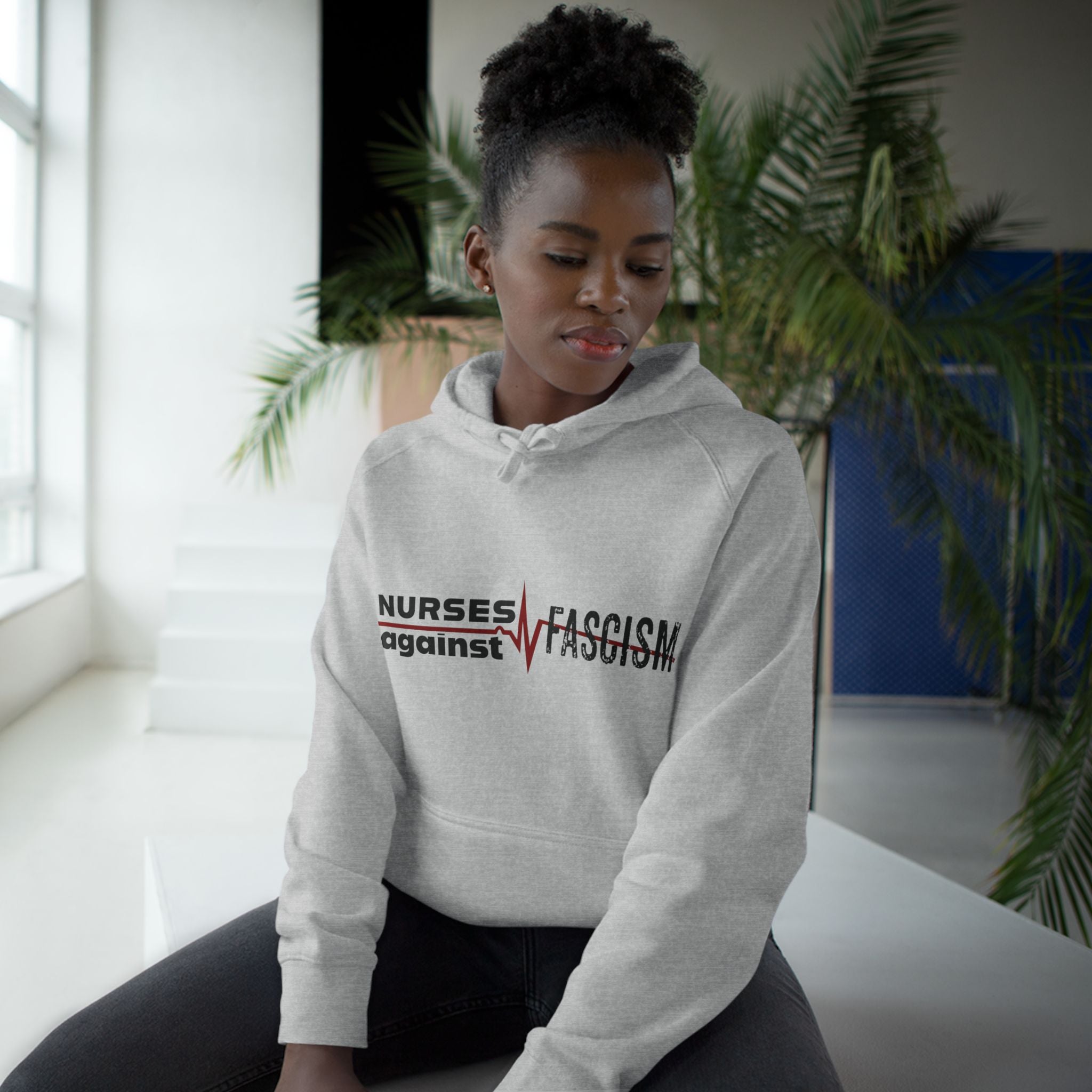 Unisex Mid-weight Hoodie - Nurses Against Fascism (front) - Nurses Against Cruelty (back) - 80% cotton, 20% polyester - NAF-H-AC5101