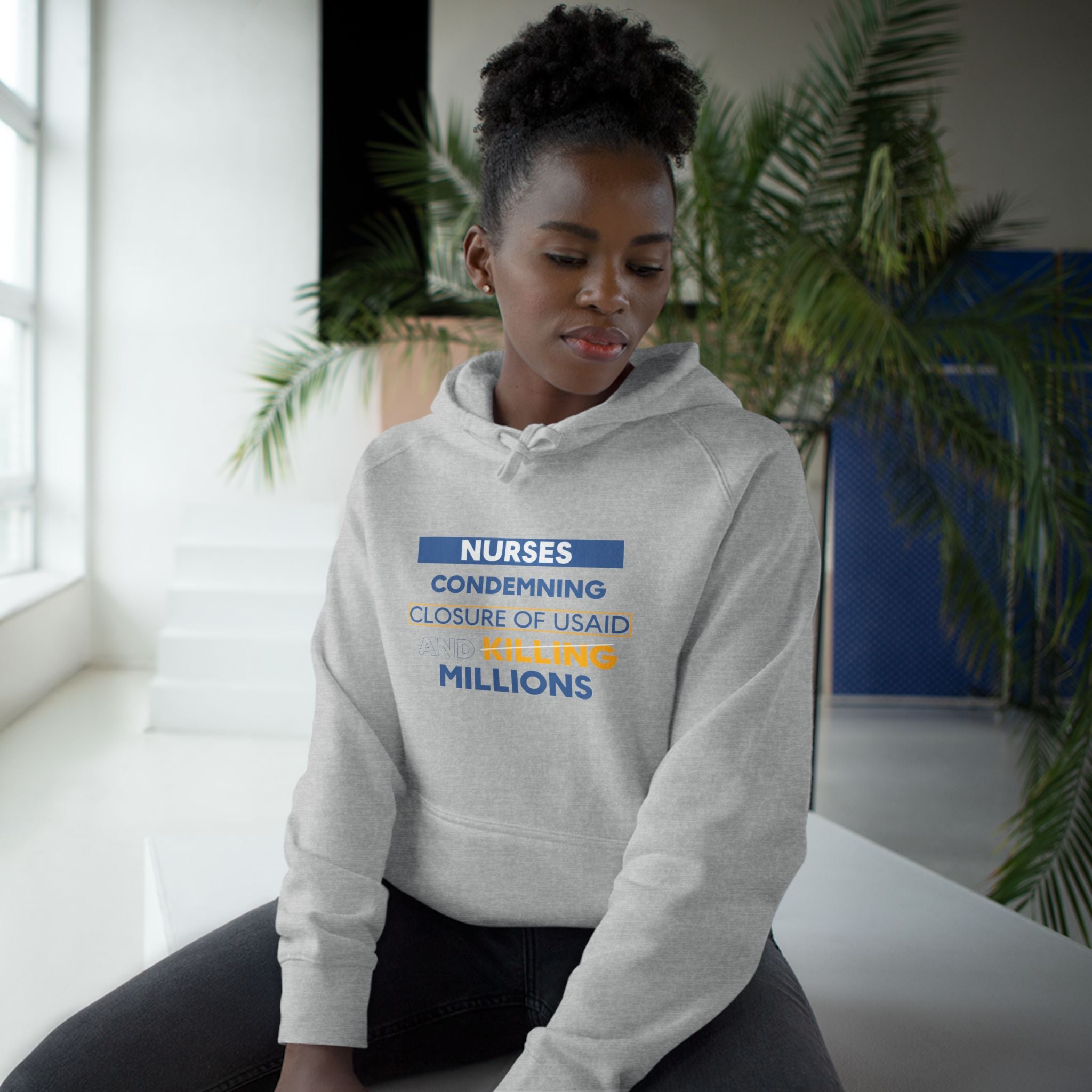 Unisex Mid-weight Hoodie - Nurses Condemning Closure of USAID (front) - Nurses For NIH CDC FEMA USAID And YOU (back) - 80% cotton, 20% Polyester - NFG-H-AC5101
