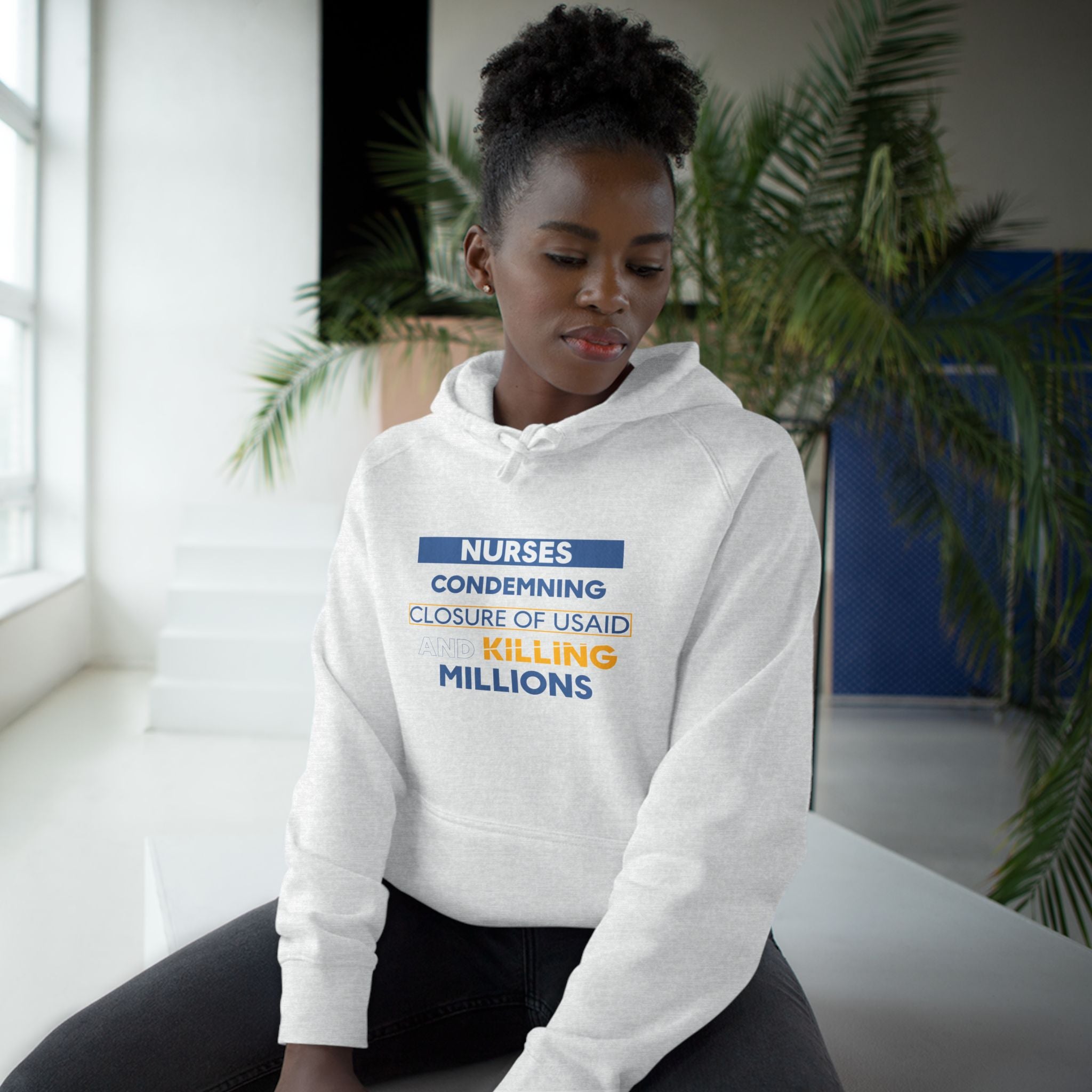 Unisex Mid-weight Hoodie - Nurses Condemning Closure of USAID (front) - Nurses For NIH CDC FEMA USAID And YOU (back) - 80% cotton, 20% Polyester - NFG-H-AC5101