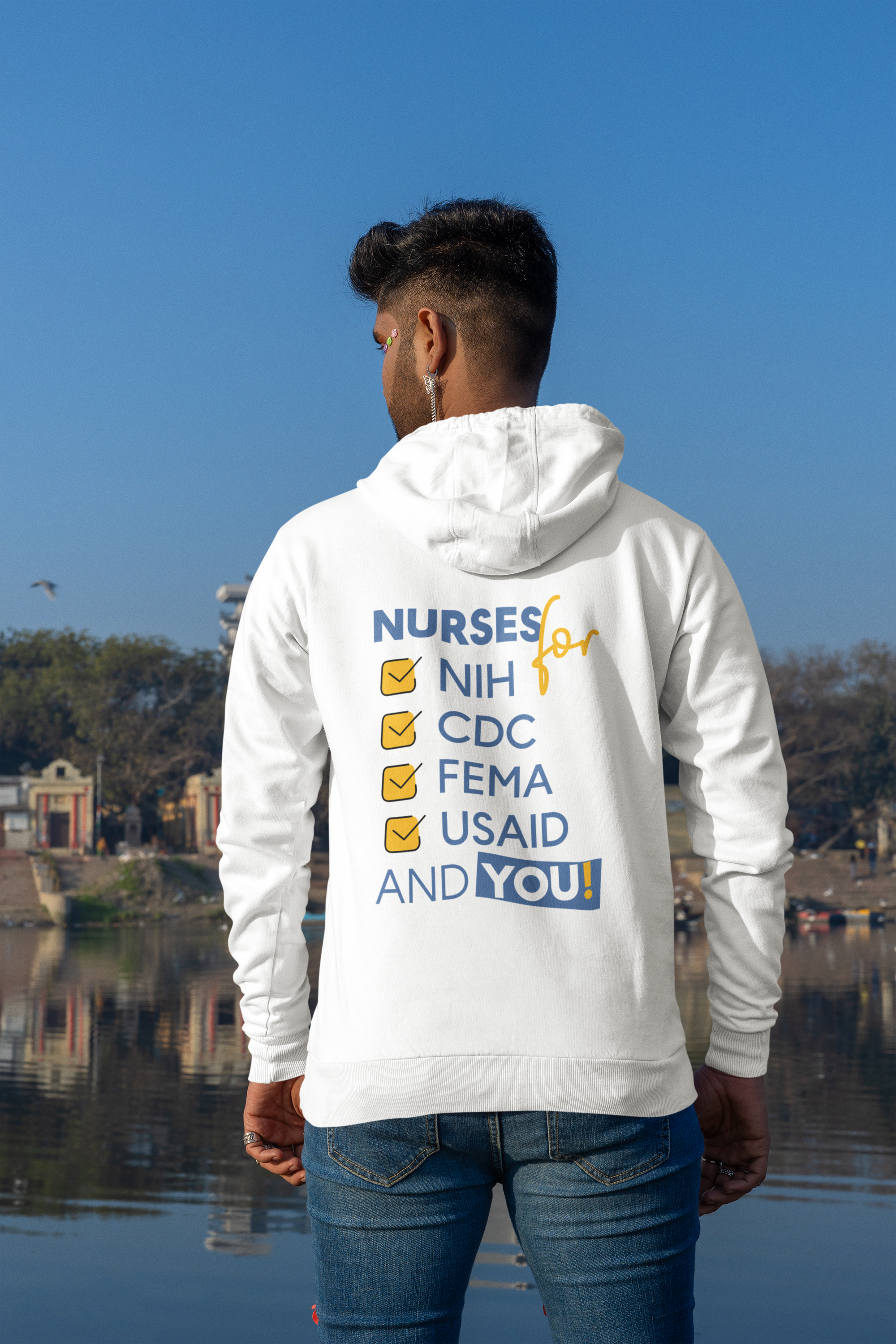 Unisex Mid-weight Hoodie - Nurses Condemning Closure of USAID (front) - Nurses For NIH CDC FEMA USAID And YOU (back) - 80% cotton, 20% Polyester - NFG-H-AC5101
