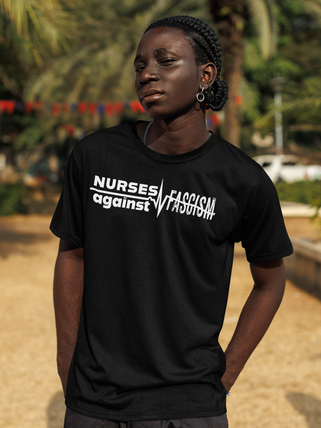 Unisex Midweight T-shirt, Nurses Against Fascism (front) - Nurses Against Cruelty (back) - 100% Polyster - NAF-T-BS5040