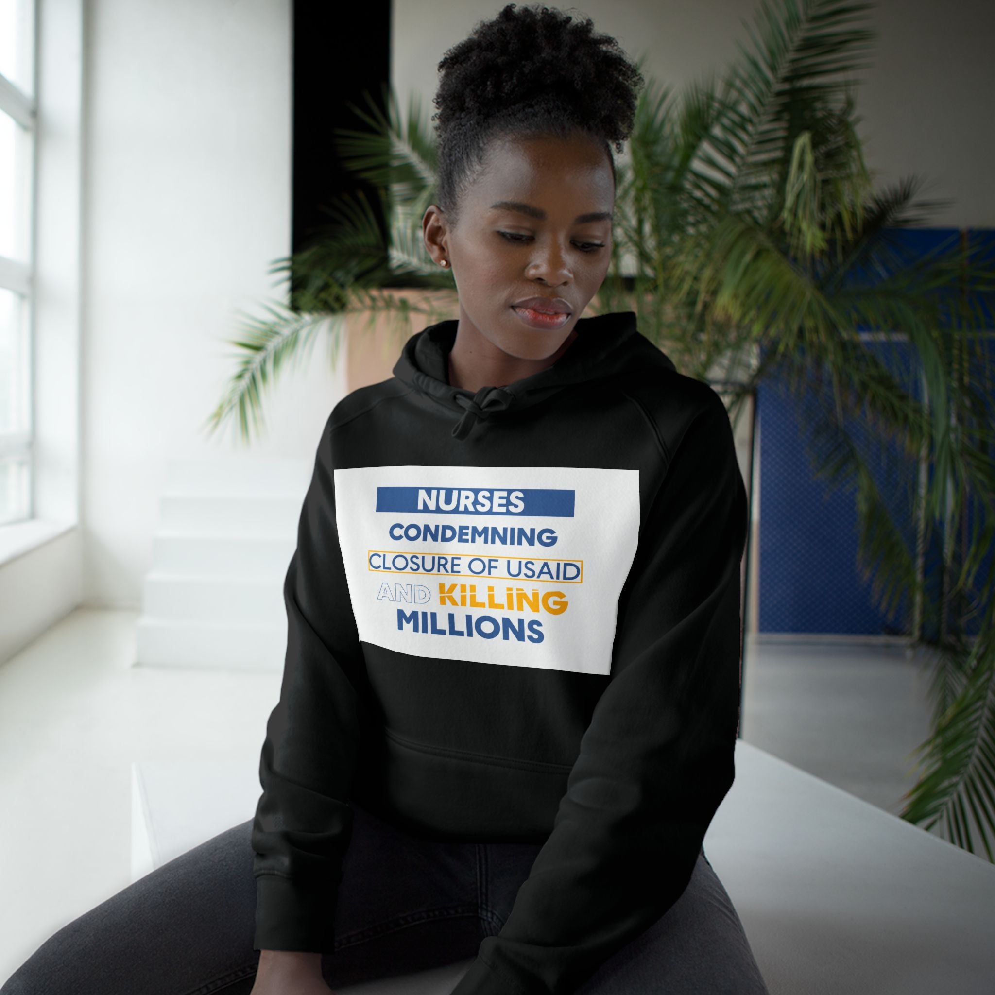 Unisex Mid-weight Hoodie - Nurses Condemning Closure of USAID (front) - Nurses For NIH CDC FEMA USAID And YOU (back) - 80% cotton, 20% Polyester - NFG-H-AC5101
