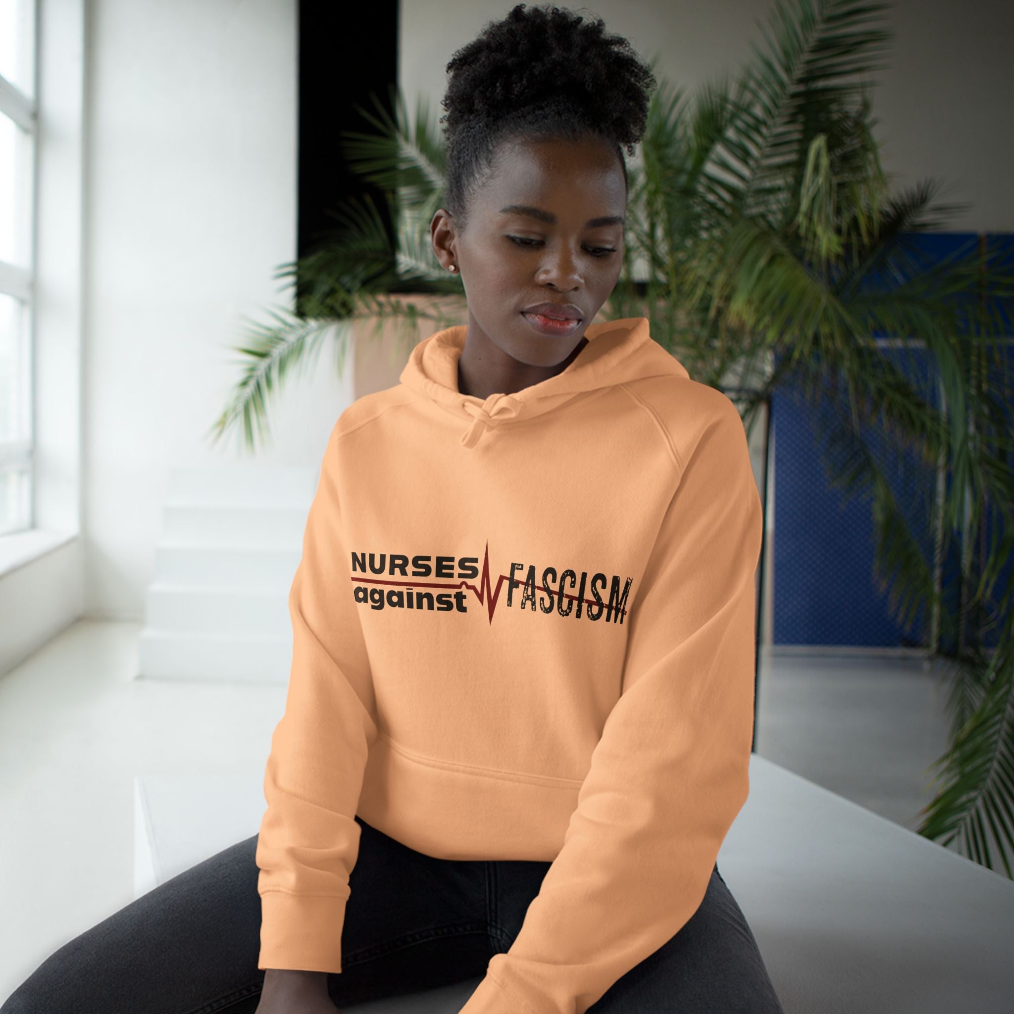 Unisex Mid-weight Hoodie - Nurses Against Fascism (front) - Nurses Against Cruelty (back) - 80% cotton, 20% polyester - NAF-H-AC5101