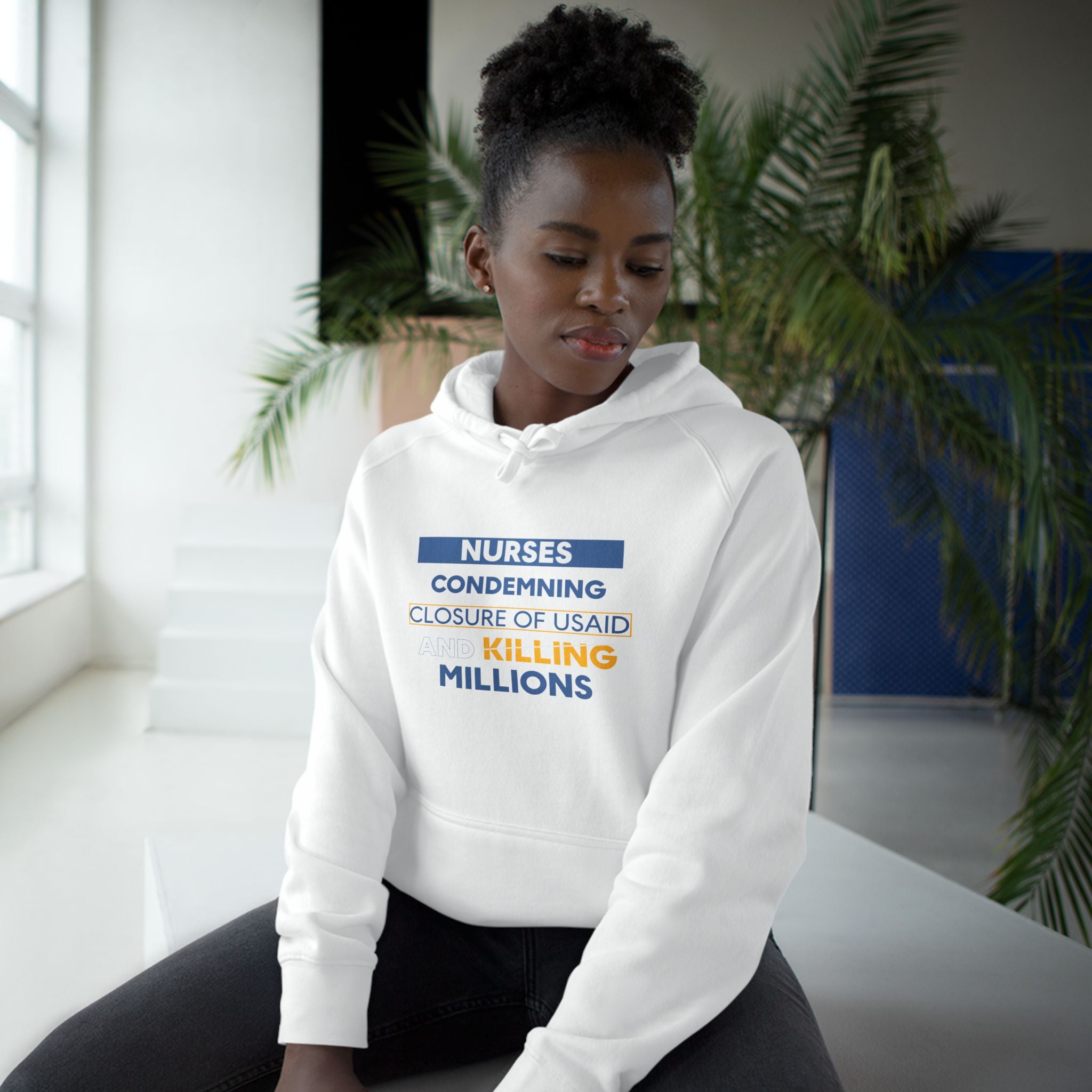 Unisex Mid-weight Hoodie - Nurses Condemning Closure of USAID (front) - Nurses For NIH CDC FEMA USAID And YOU (back) - 80% cotton, 20% Polyester - NFG-H-AC5101